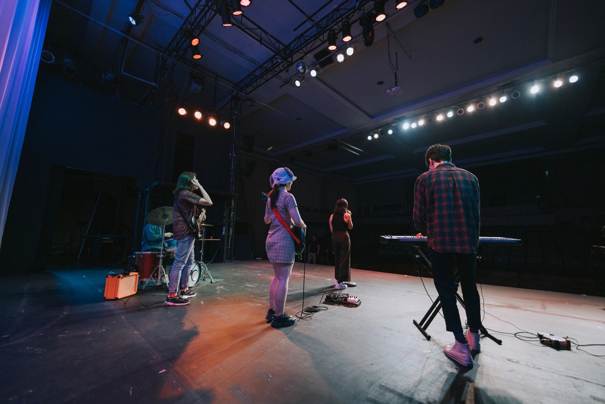 Band performing on stage during sound check