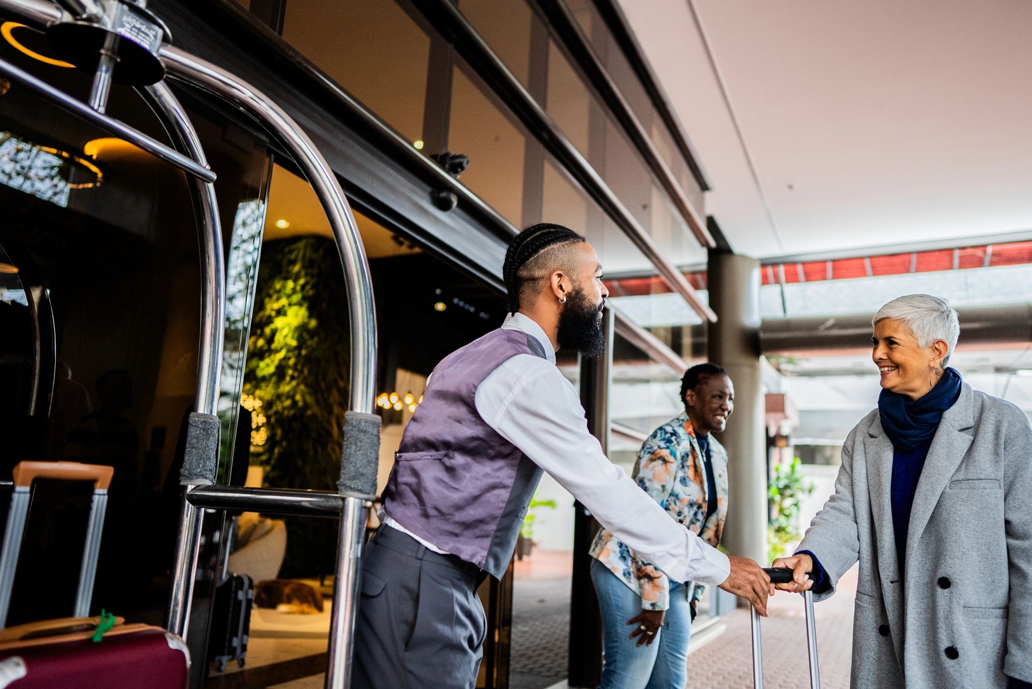 Hospitality staff welcoming guests
